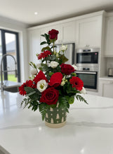 Seasonal Elegance Arrangement a Festive Pot