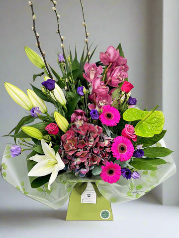 Grand Orchid & Lily Flower Vibrant Arrangement -From